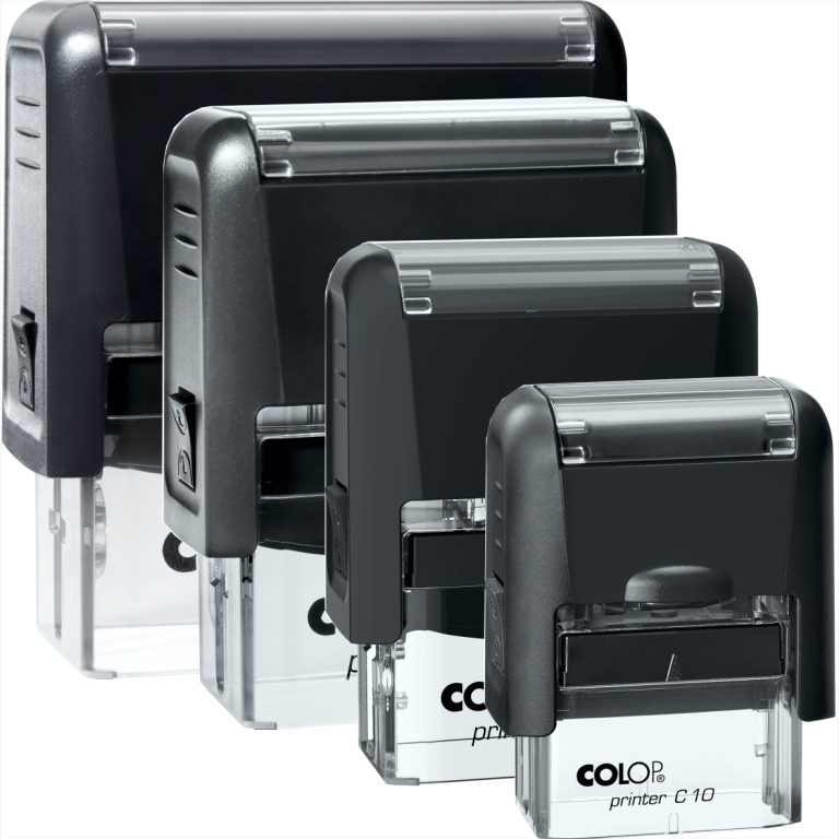 Vier schwarze Stempel in unterschiedlichen Größen auf einer weißen Fläche.